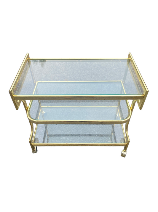 Hollywood Regency Heavy Brass and Glass Three Shelf Bar Tea Cart On Wheels